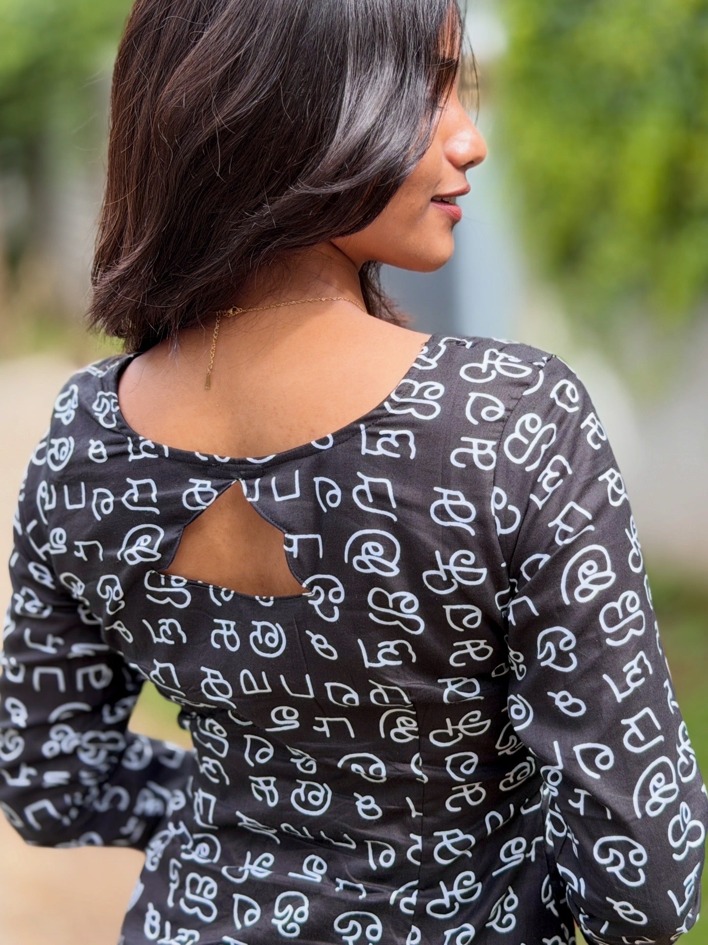 AC224 Tamil Font Black cotton Kurti